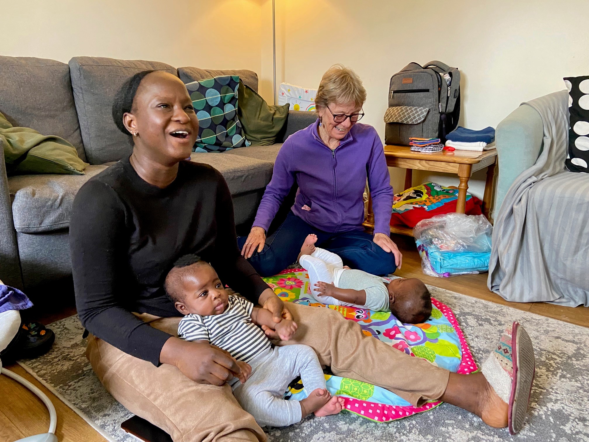 One of our volunteers with the family she supports