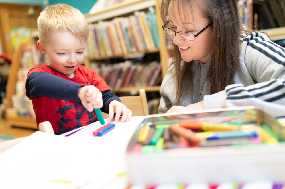 Mum and boy colouring