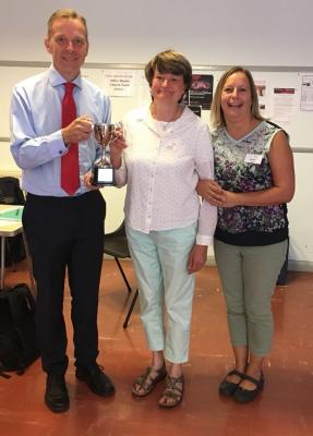 Matt Rodda MP presenting Alison with the cup.