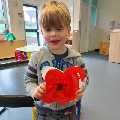 A boy with his remembrance poppy