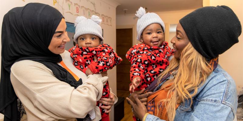 Volunteer with mum and twins